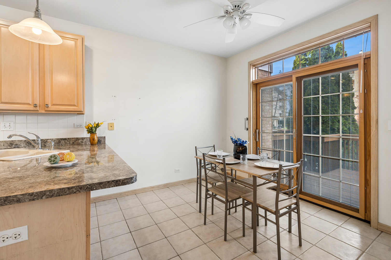 1738 Park Ridge Point Park Ridge, IL 60068 - Photo 9 of 27 a view of a dining room with furniture and a chandelier