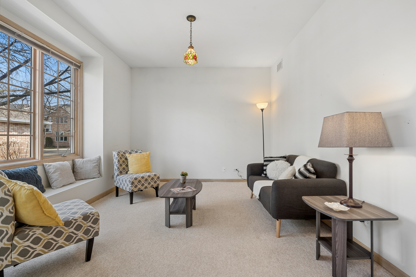 1738 Park Ridge Point Park Ridge, IL 60068 - Photo 10 of 27 a living room with furniture and a window