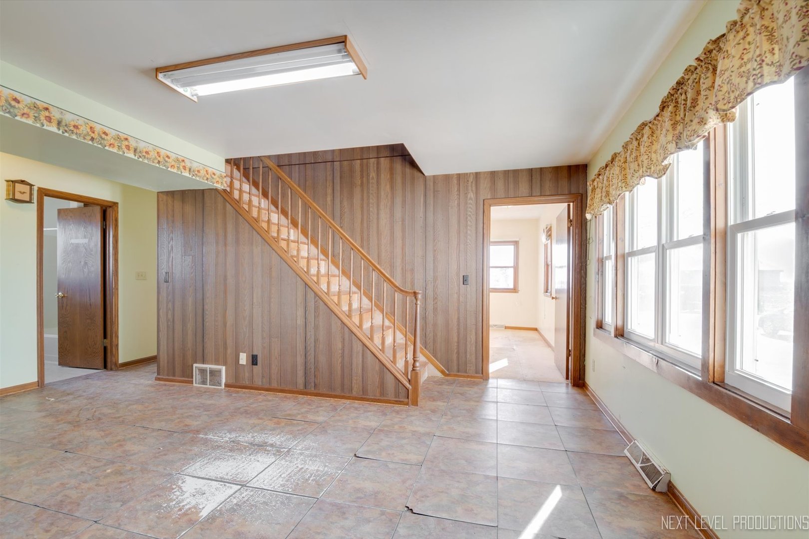12029 Faxon Road Plano, IL 60545 - Photo 9 of 26 a view of an entryway with wooden floor