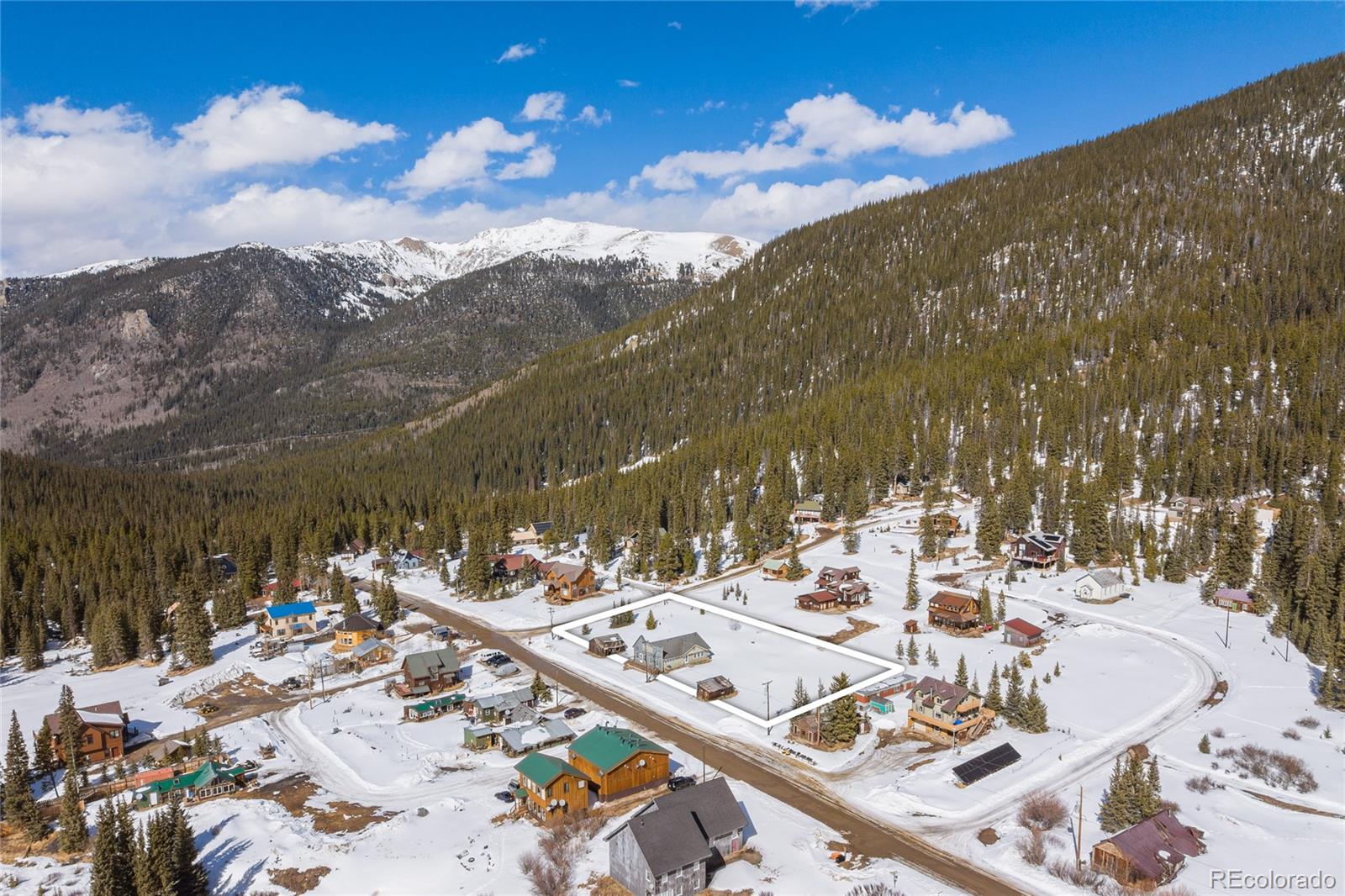 5355 Montezuma Road Montezuma, CO 80435 - Photo 3 of 50 a view of a terrace with furniture and a flat screen tv