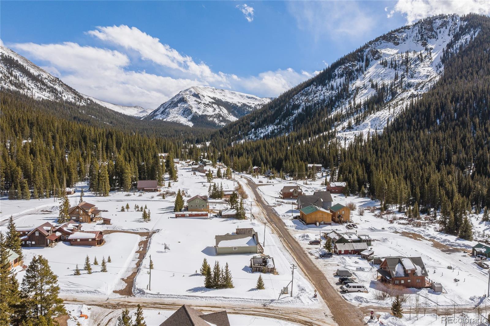 5355 Montezuma Road Montezuma, CO 80435 - Photo 4 of 50 a view of swimming pool with a patio