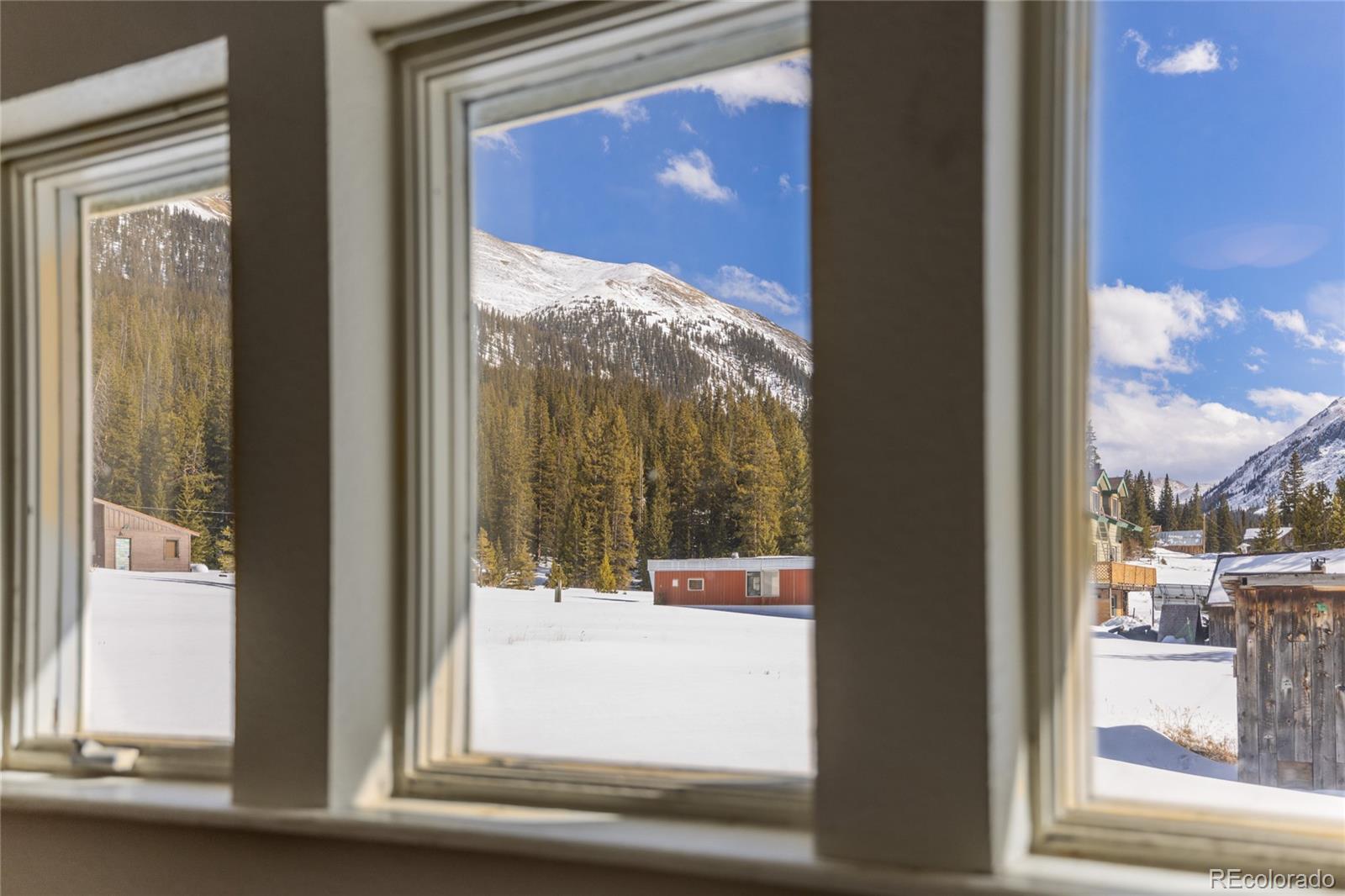 5355 Montezuma Road Montezuma, CO 80435 - Photo 41 of 50 a view of a glass door and a window