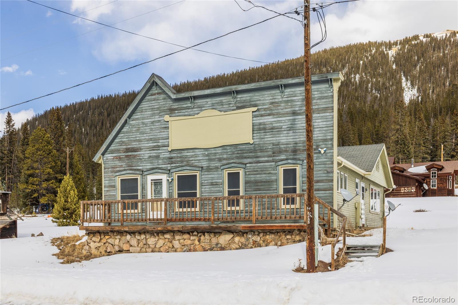 5355 Montezuma Road Montezuma, CO 80435 - Photo 6 of 50 a front view of a house with a yard