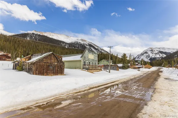 a view of a house with a snow