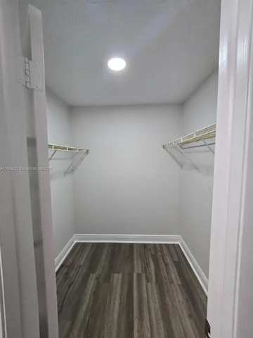 a view of a house with a garden