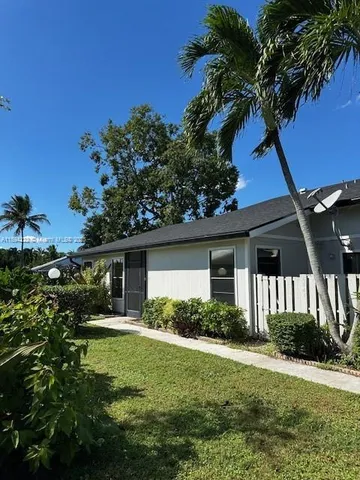 a view of a lot of flower in a window