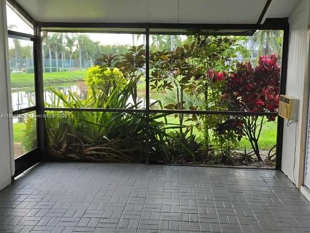 a view of swimming pool from a balcony