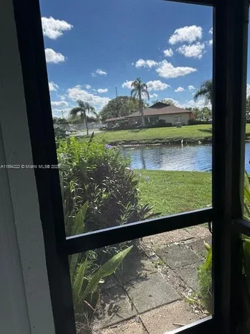 a view of a lake in a city