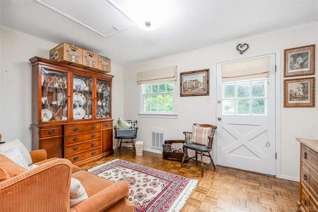 a living room with furniture and a window