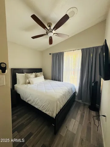 a view of kitchen sink and microwave with wooden floor