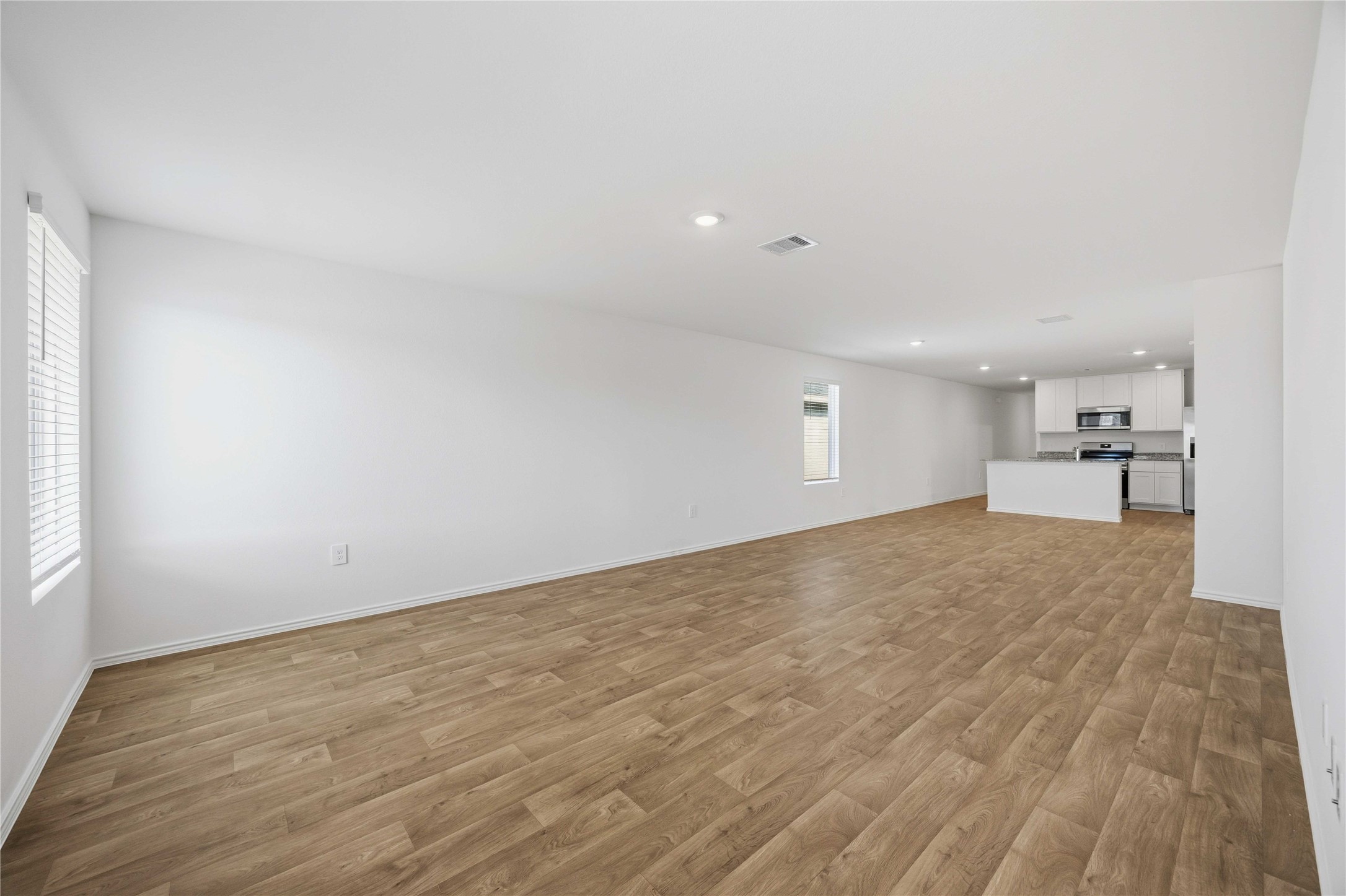 11913 Sweet Apple Lane Houston, TX 77048 - Photo 10 of 20 a view of empty room with wooden floor