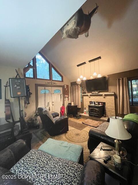 1450 Deer Run East Bushkill, PA 18324 - Photo 17 of 24 a living room with furniture a fireplace and a flat screen tv