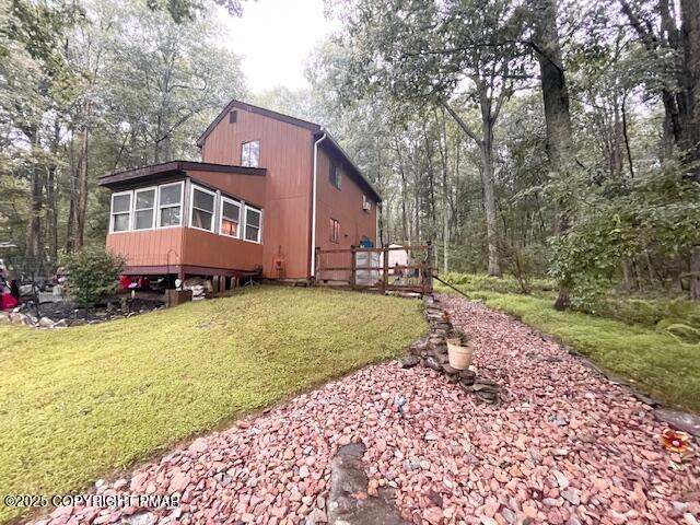 1450 Deer Run East Bushkill, PA 18324 - Photo 2 of 24 a front view of a house with a yard