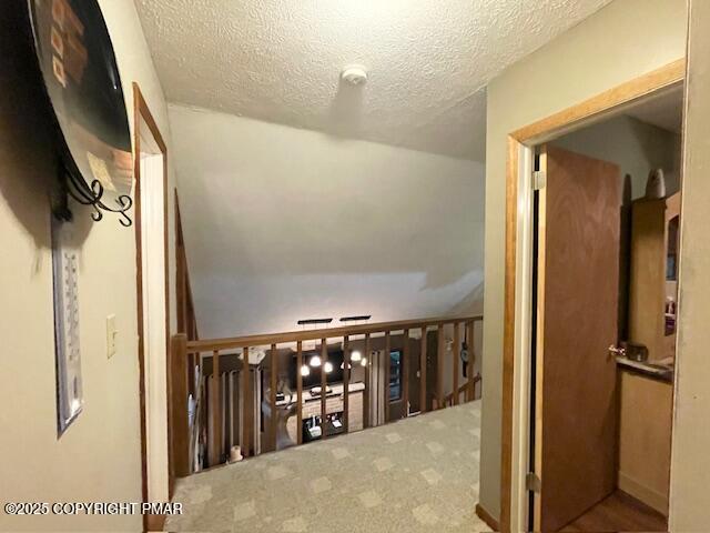 1450 Deer Run East Bushkill, PA 18324 - Photo 22 of 24 a view of a hallway with wooden floor and staircase
