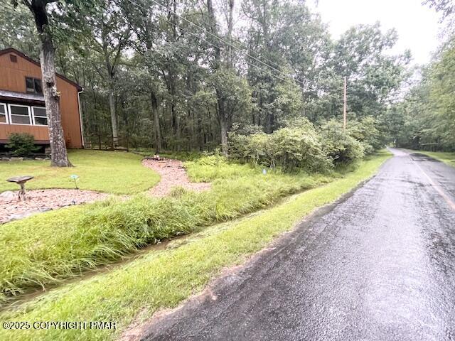 1450 Deer Run East Bushkill, PA 18324 - Photo 5 of 24 a view of backyard of house