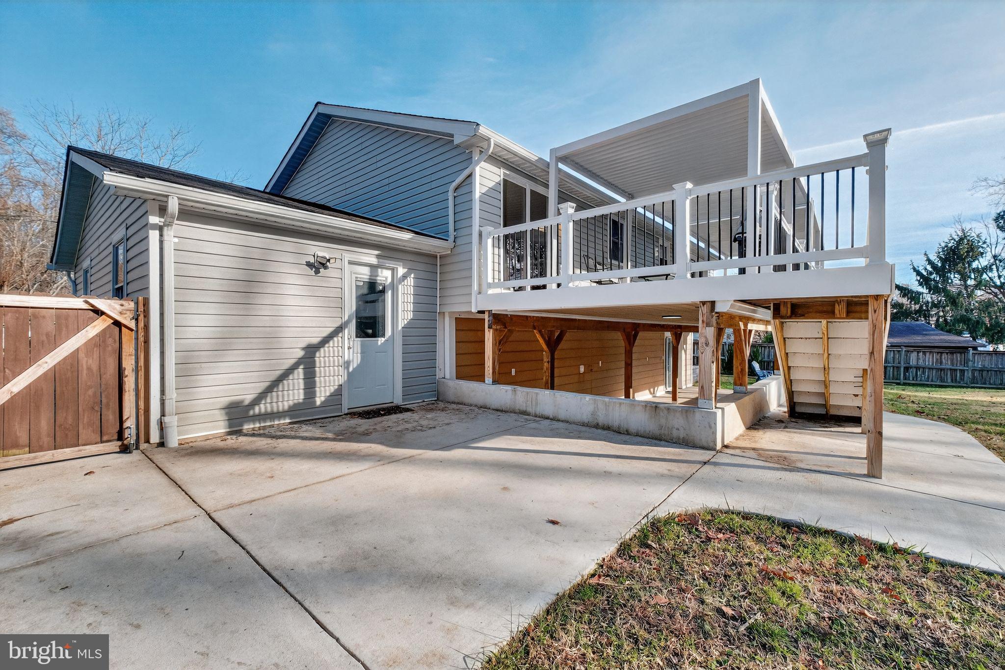 12608 Carland Place Laurel, MD 20708 - Photo 26 of 38 a view of a house with a balcony