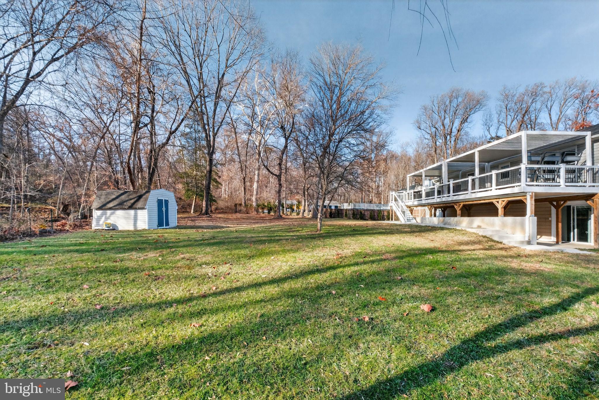 12608 Carland Place Laurel, MD 20708 - Photo 34 of 38 a front view of a house with a yard