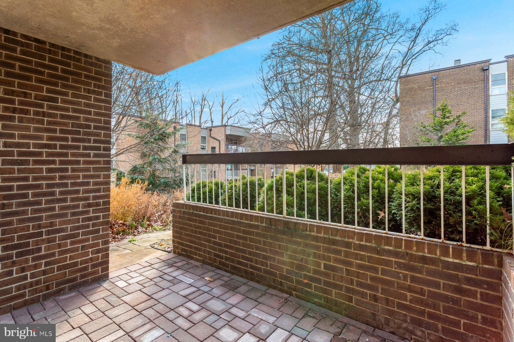 2305 Greenery Lane, Unit T43 Silver Spring, MD 20906 - Photo 26 of 30 a view of a black gate