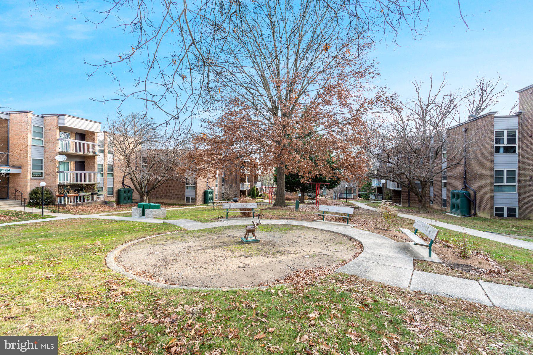 2305 Greenery Lane, Unit T43 Silver Spring, MD 20906 - Photo 29 of 30 a view of a fountain in front of a building
