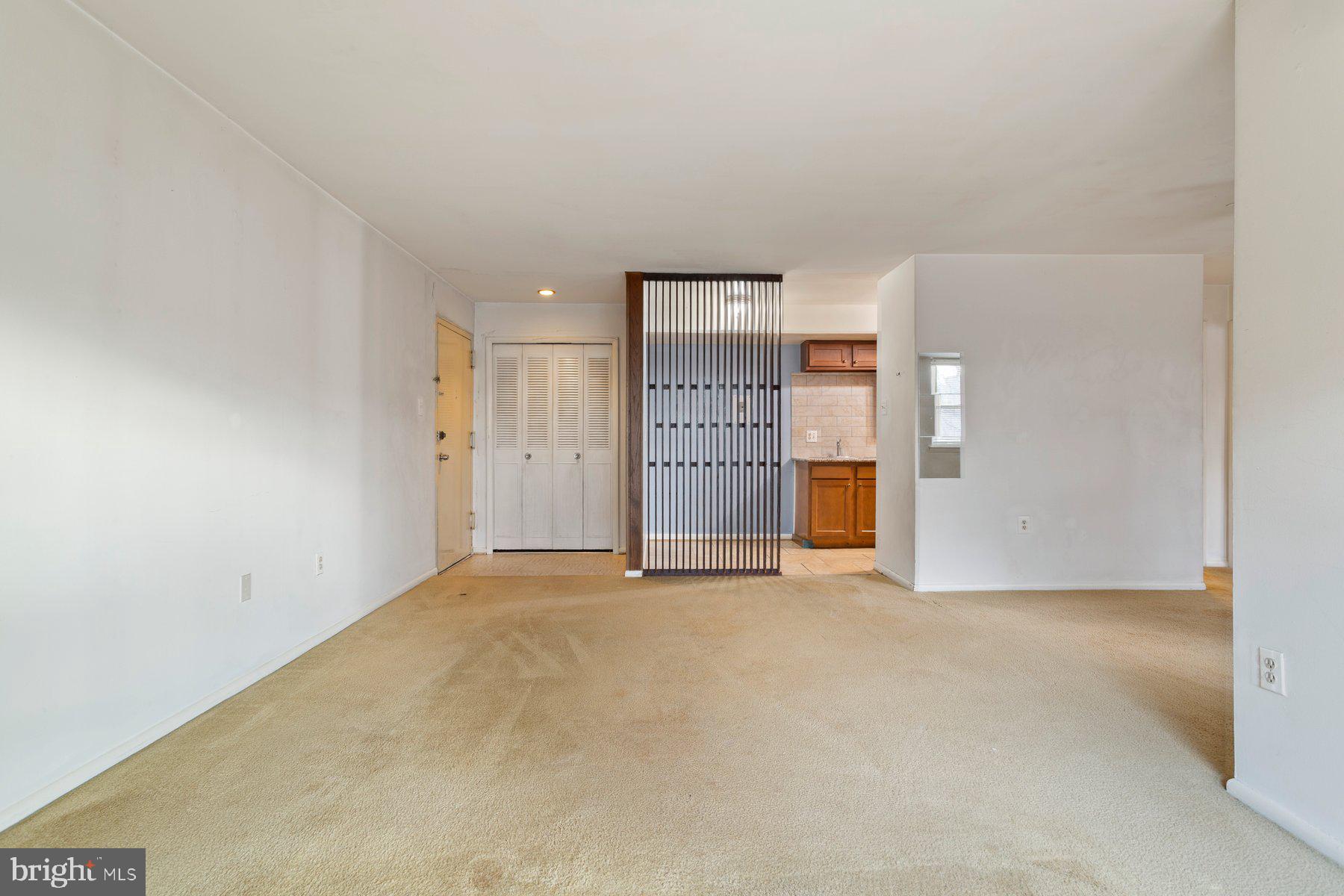 2305 Greenery Lane, Unit T43 Silver Spring, MD 20906 - Photo 8 of 30 a view of an empty room with a window