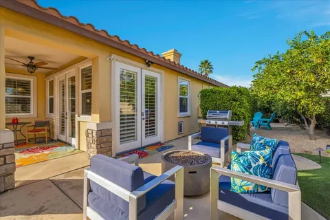 a view of outdoor sitting area with furniture