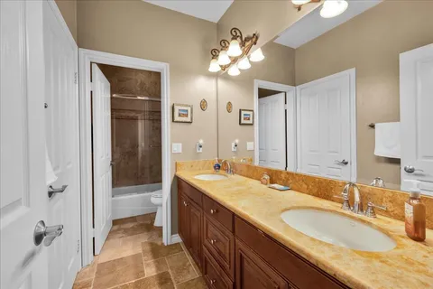 a bathroom with a shower and a toilet