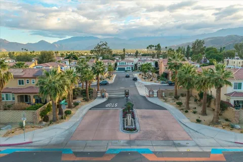 a view of a swimming pool with a lounge chairs