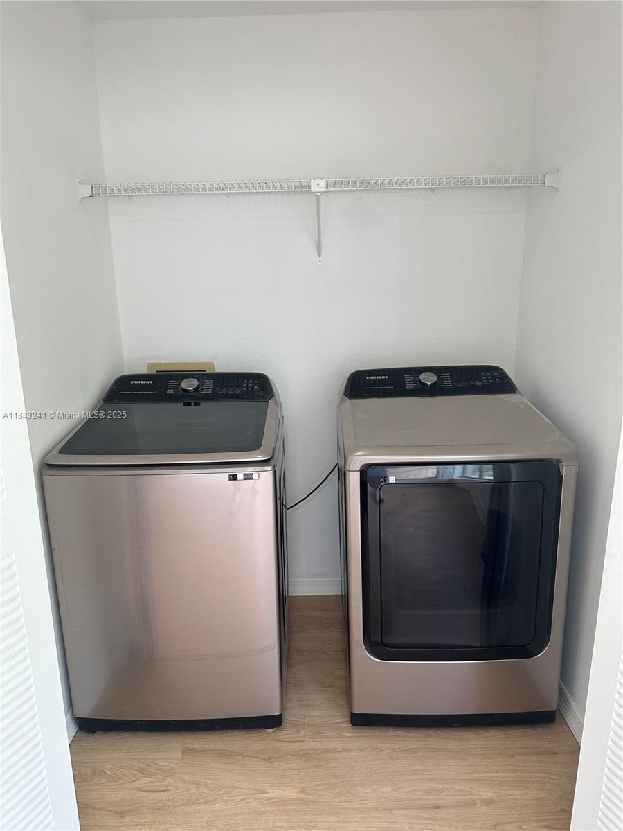 2846 South University Drive, Unit 4202 Davie, FL 33328 - Photo 15 of 17 a utility room with dryer and washer