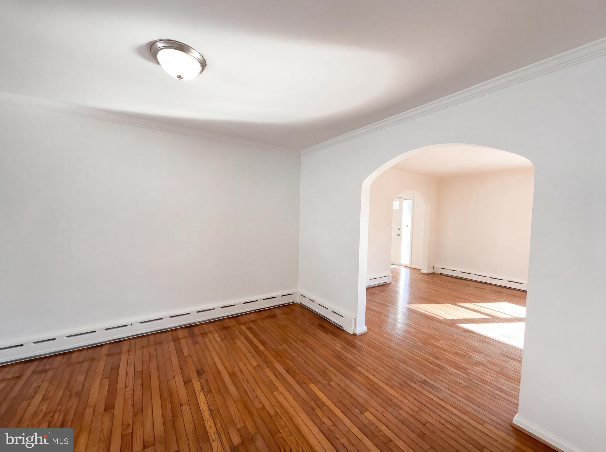 6048 Old Telegraph Road Alexandria, VA 22310 - Photo 11 of 43 a view of a room with wooden floor