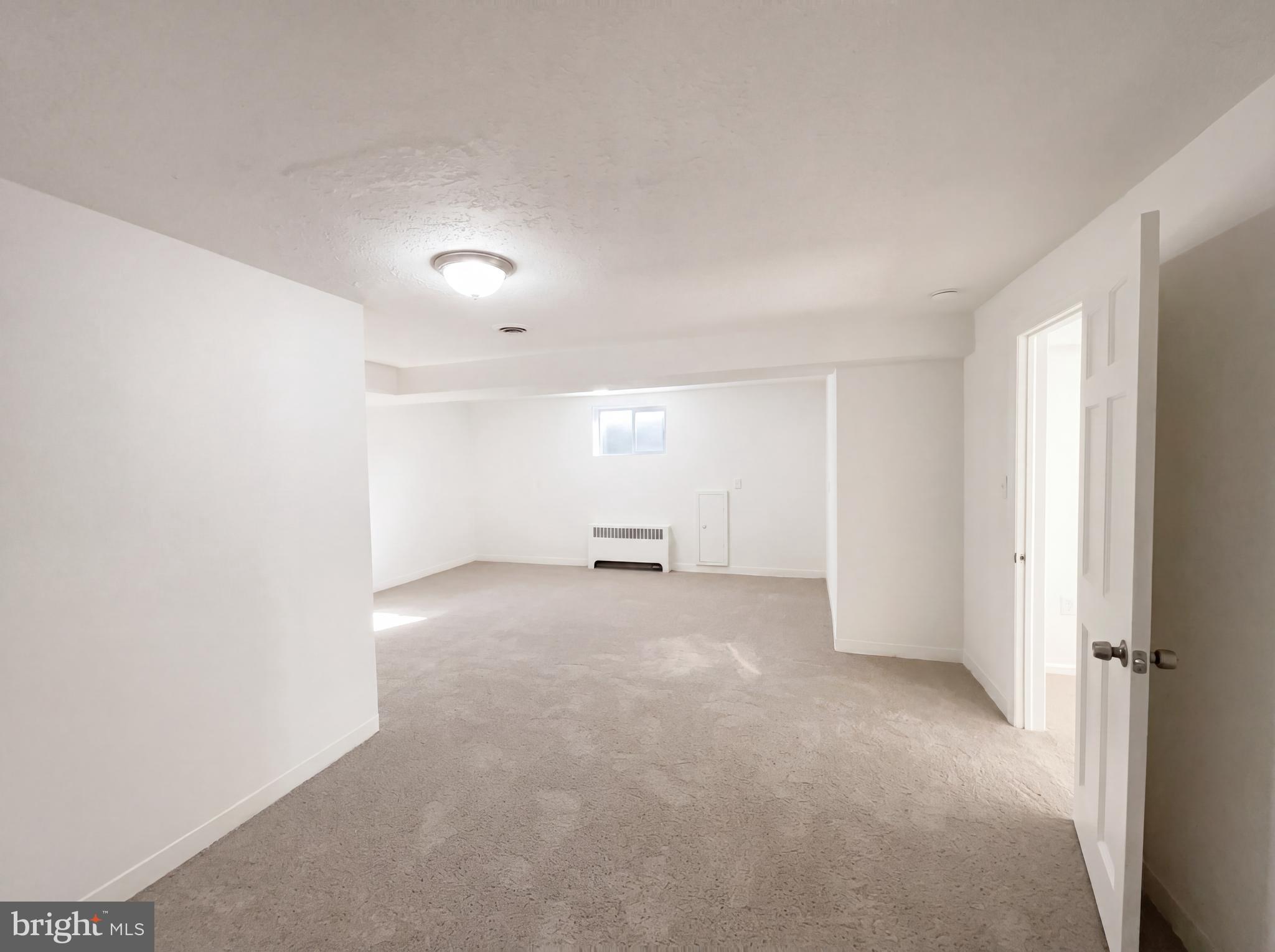 6048 Old Telegraph Road Alexandria, VA 22310 - Photo 20 of 43 a view of an empty room with a window