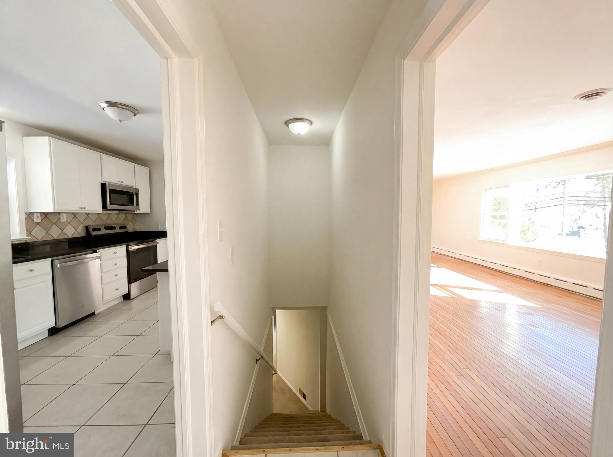 6048 Old Telegraph Road Alexandria, VA 22310 - Photo 22 of 43 a view of a kitchen from the hallway