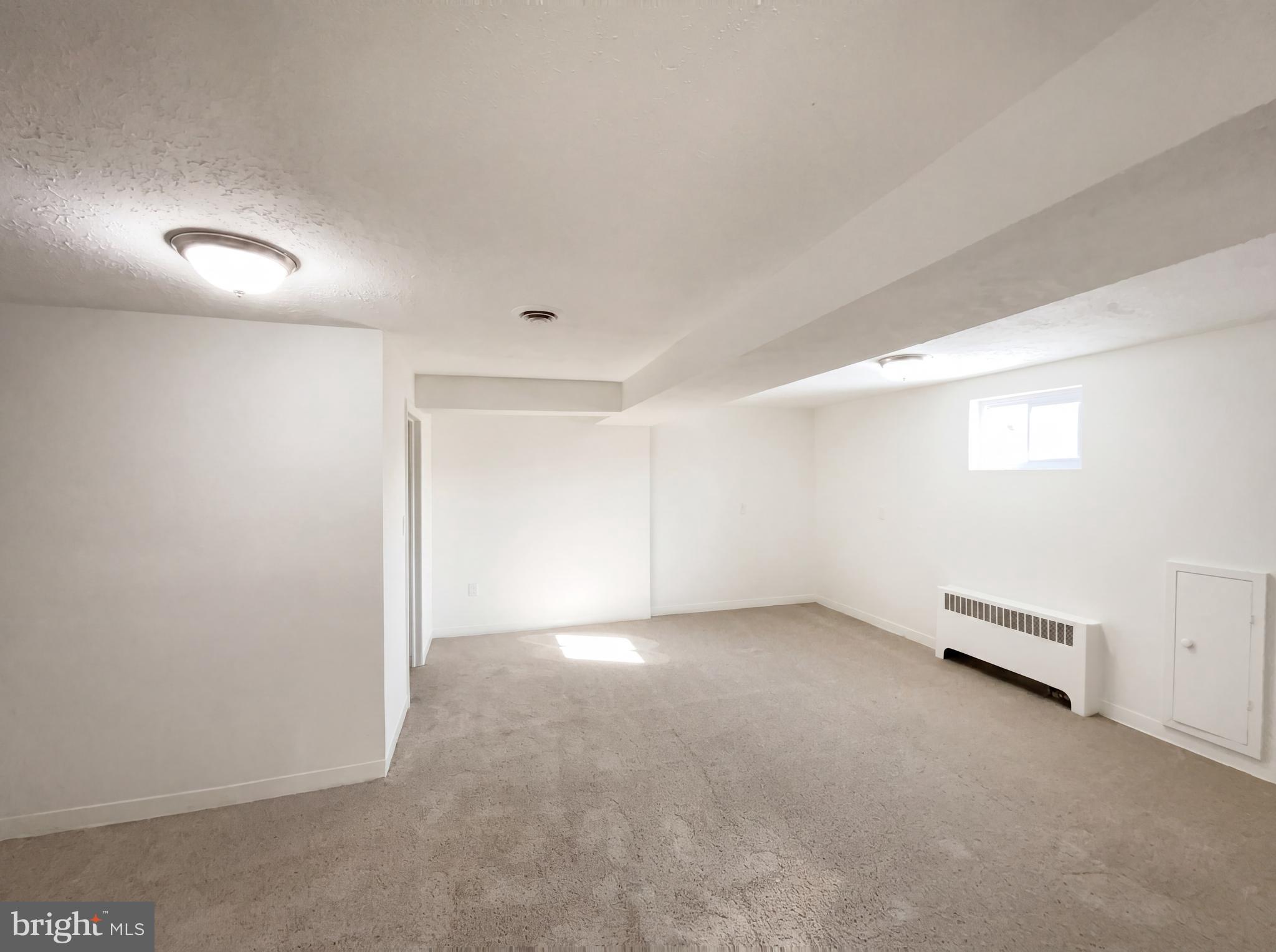 6048 Old Telegraph Road Alexandria, VA 22310 - Photo 24 of 43 an empty room with a workbench