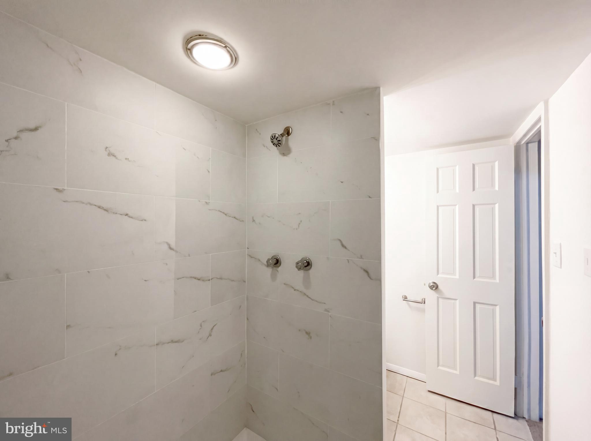 6048 Old Telegraph Road Alexandria, VA 22310 - Photo 26 of 43 a bathroom with a shower