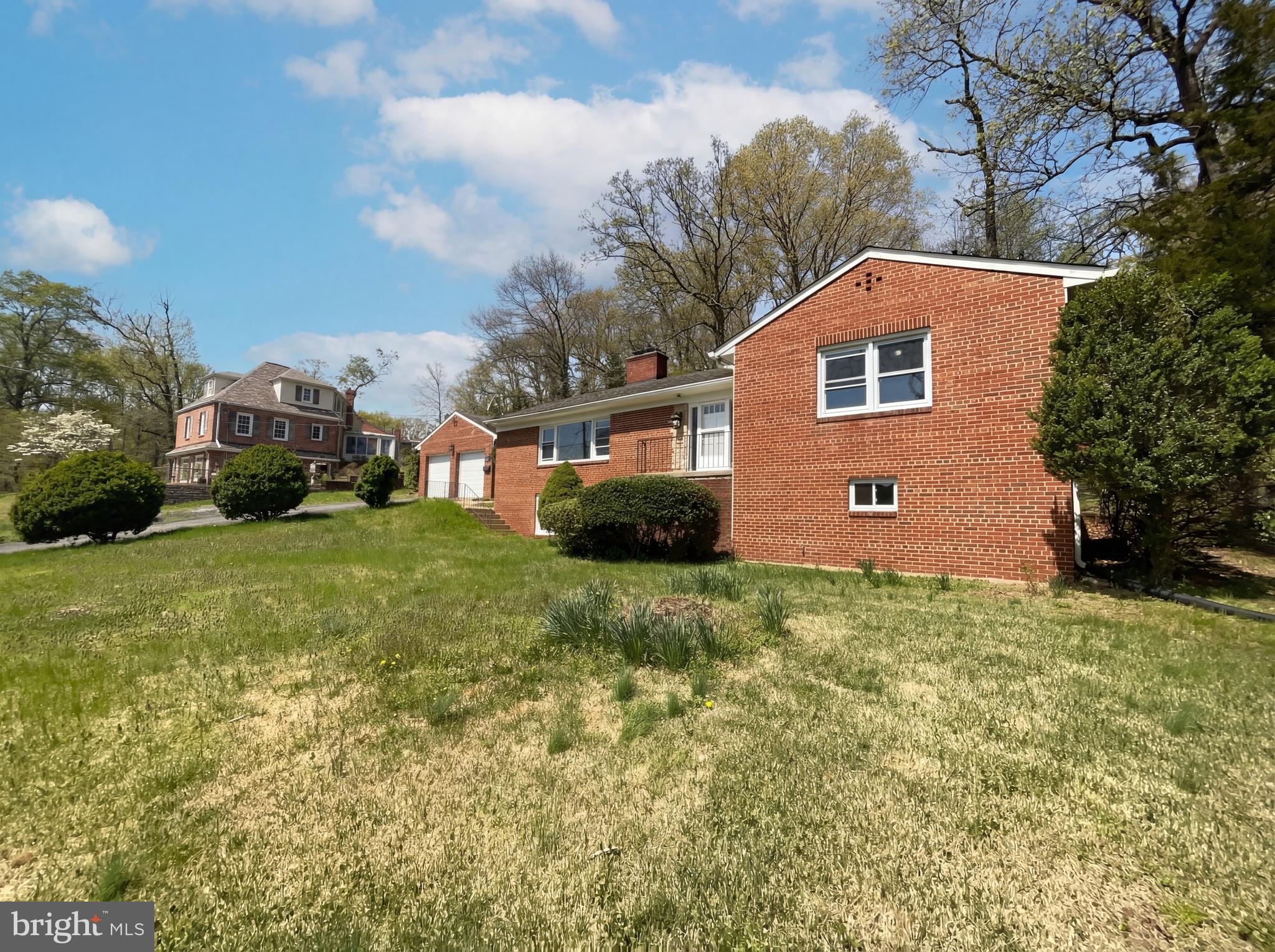 6048 Old Telegraph Road Alexandria, VA 22310 - Photo 42 of 43 a house view with a garden space