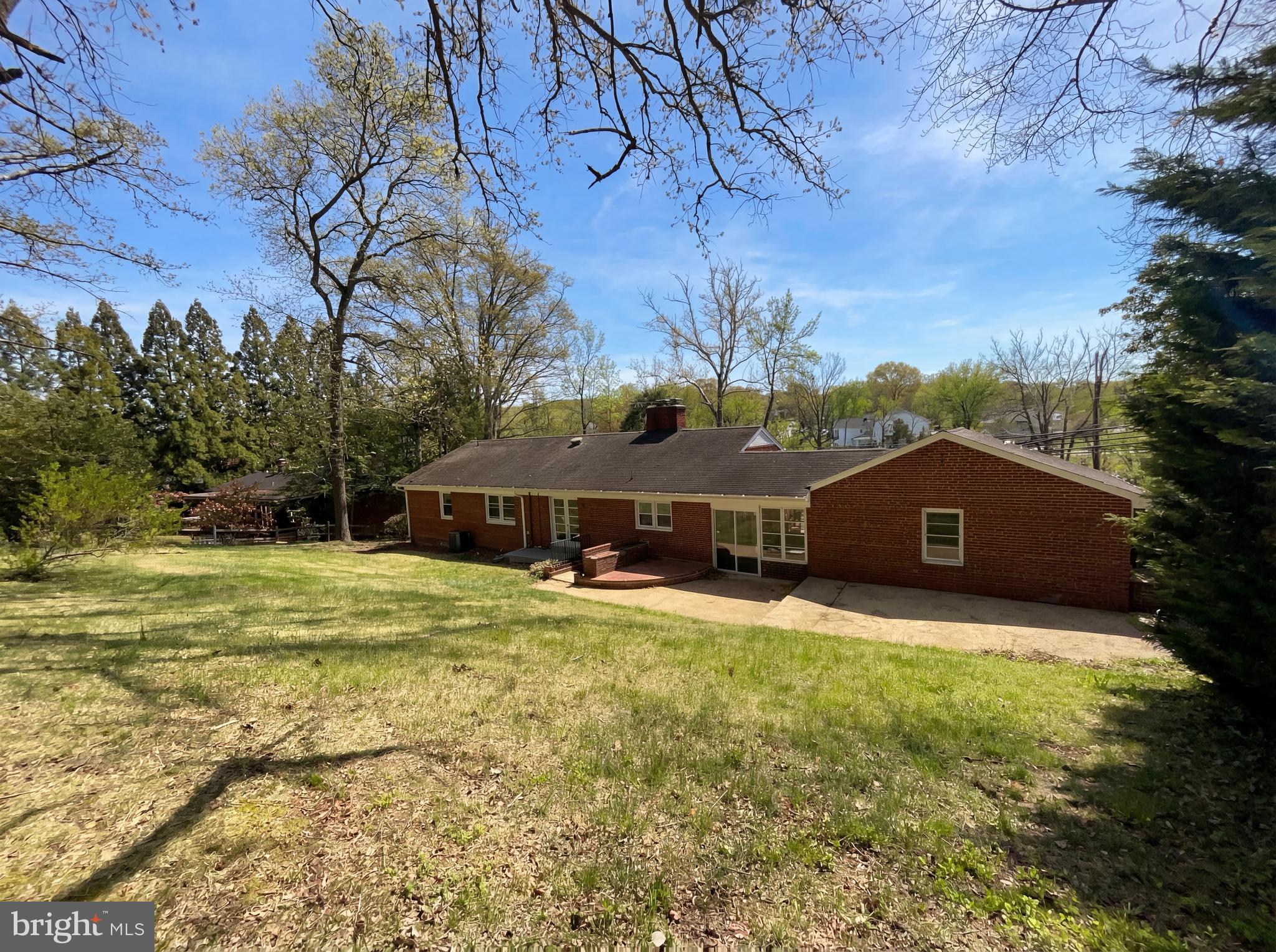 6048 Old Telegraph Road Alexandria, VA 22310 - Photo 43 of 43 a front view of a house with a yard