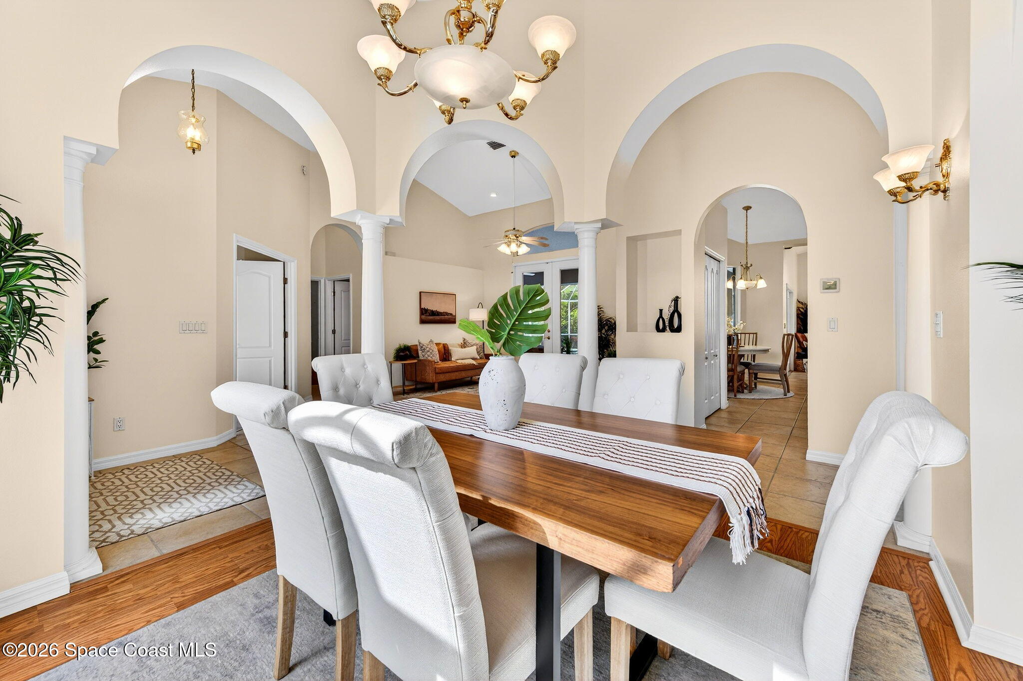 4404 Long Lake Road Melbourne, FL 32934 - Photo 17 of 92 Dining With the Entry to the Kitchen