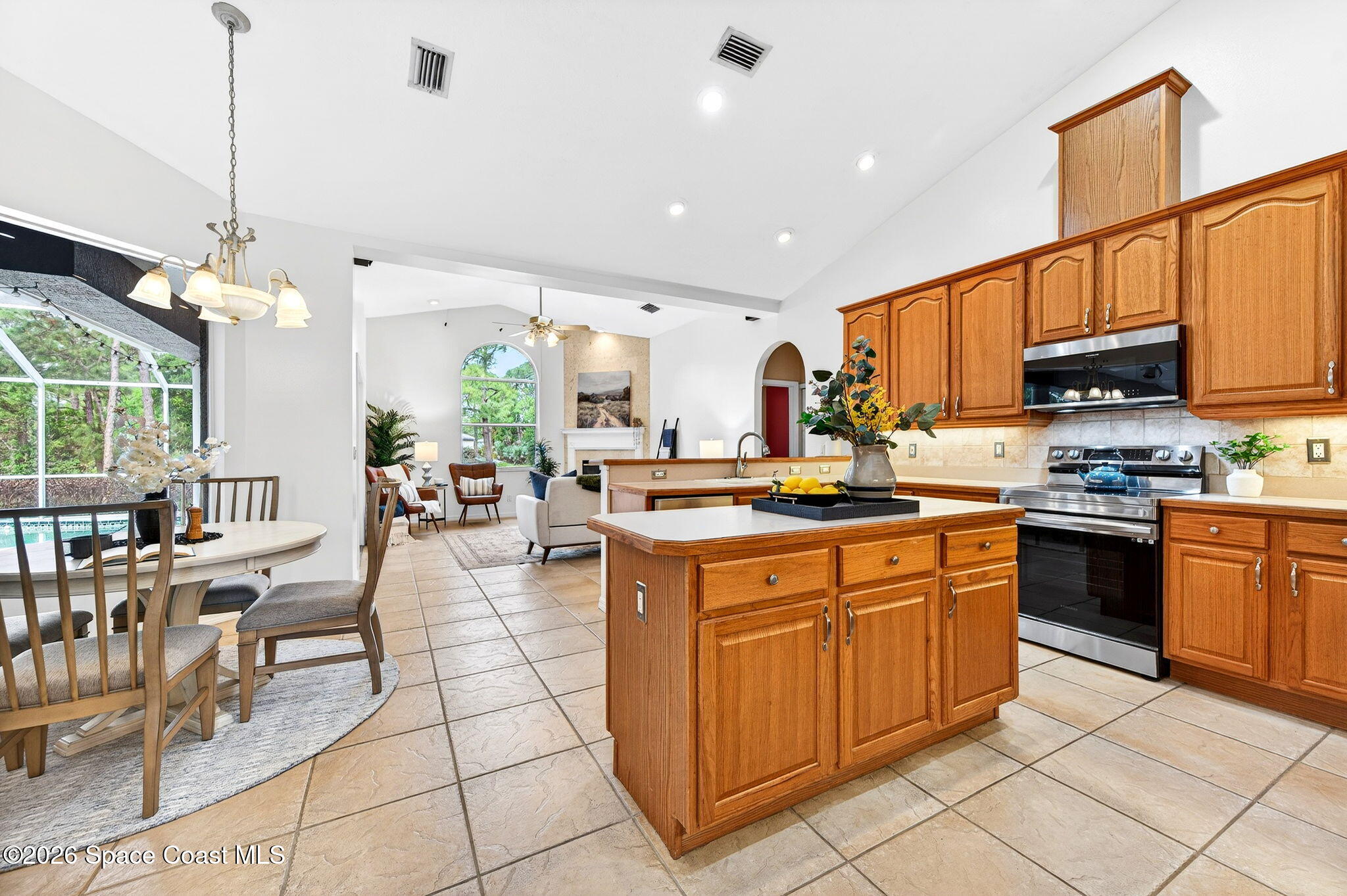 4404 Long Lake Road Melbourne, FL 32934 - Photo 19 of 92 Kitchen with the view of Family Room