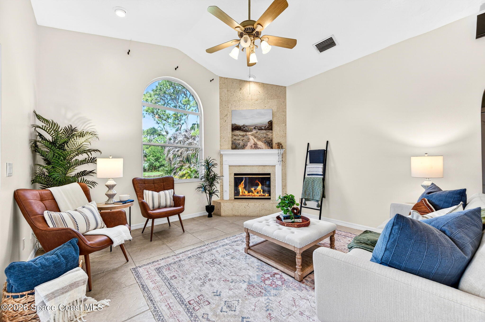 4404 Long Lake Road Melbourne, FL 32934 - Photo 28 of 92 Family Room with a fireplace