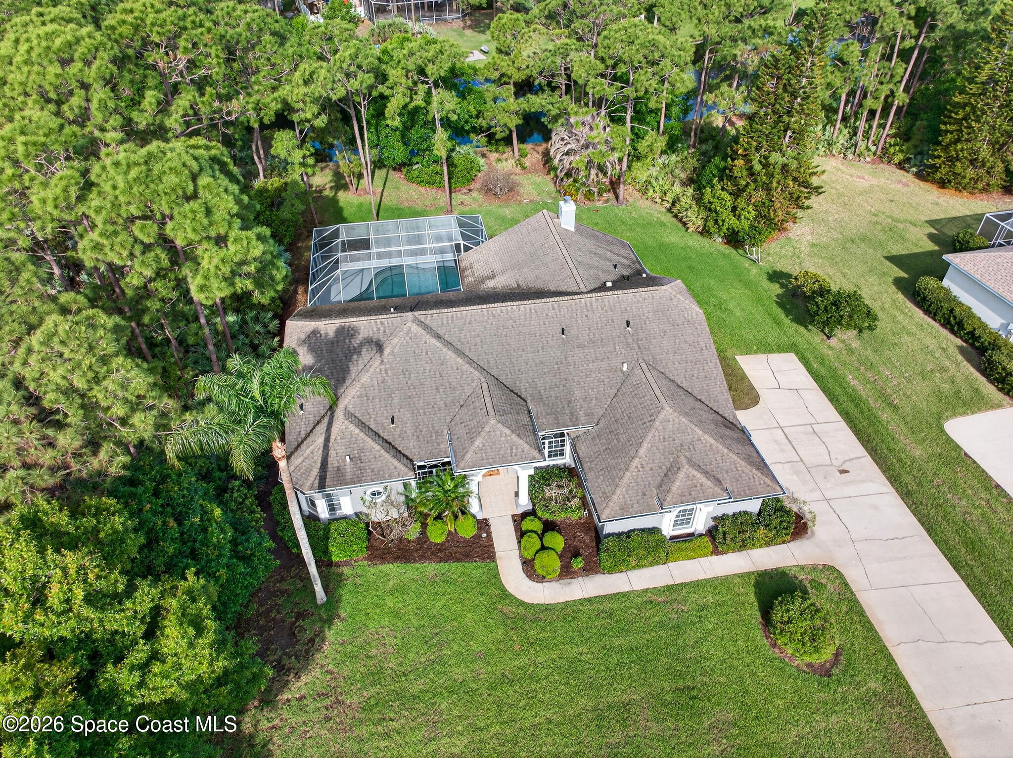 4404 Long Lake Road Melbourne, FL 32934 - Photo 4 of 92 Aerial view of the house