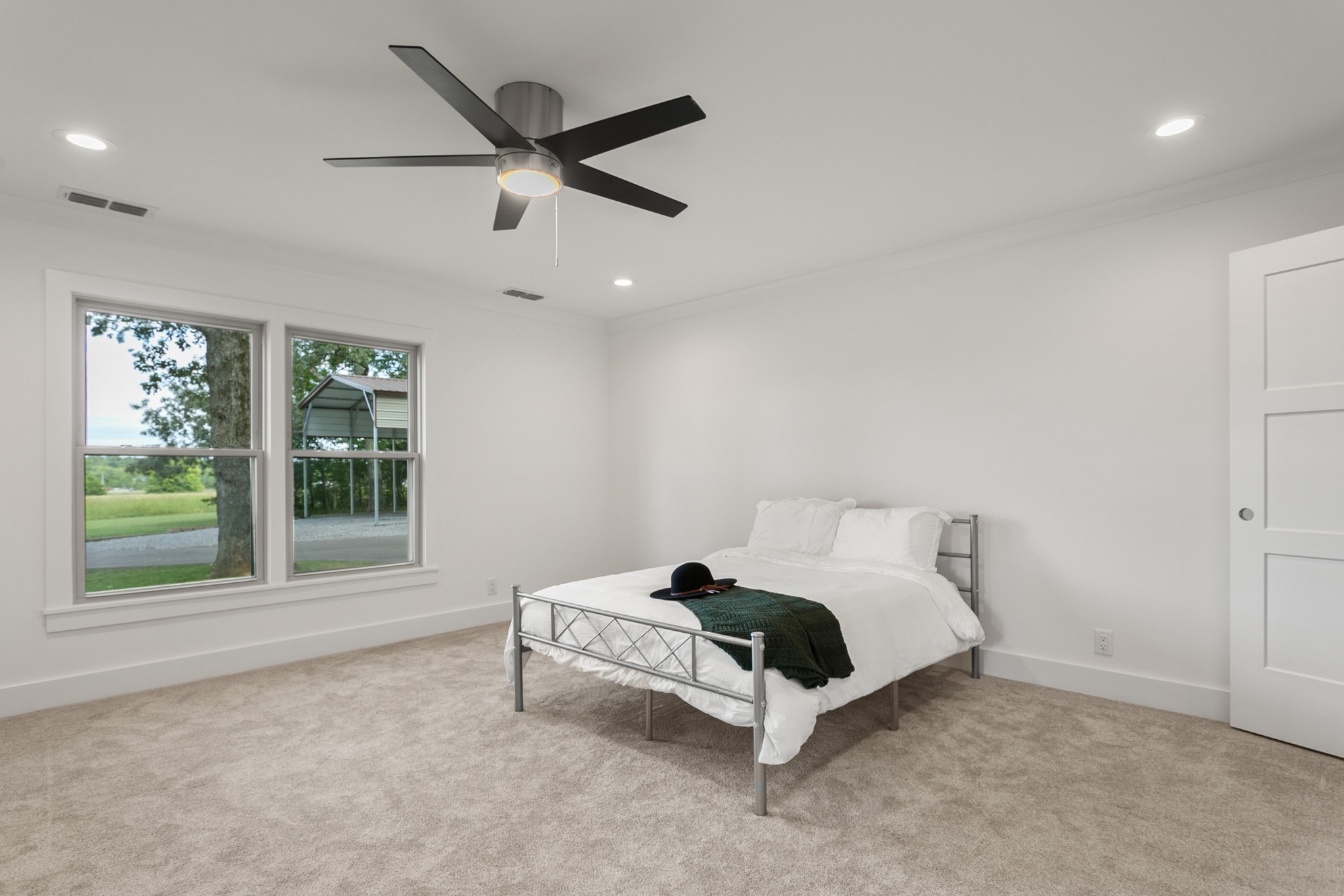 2338 North Road Murfreesboro, TN 37128 - Photo 20 of 48 a bed room with a bed and a large window