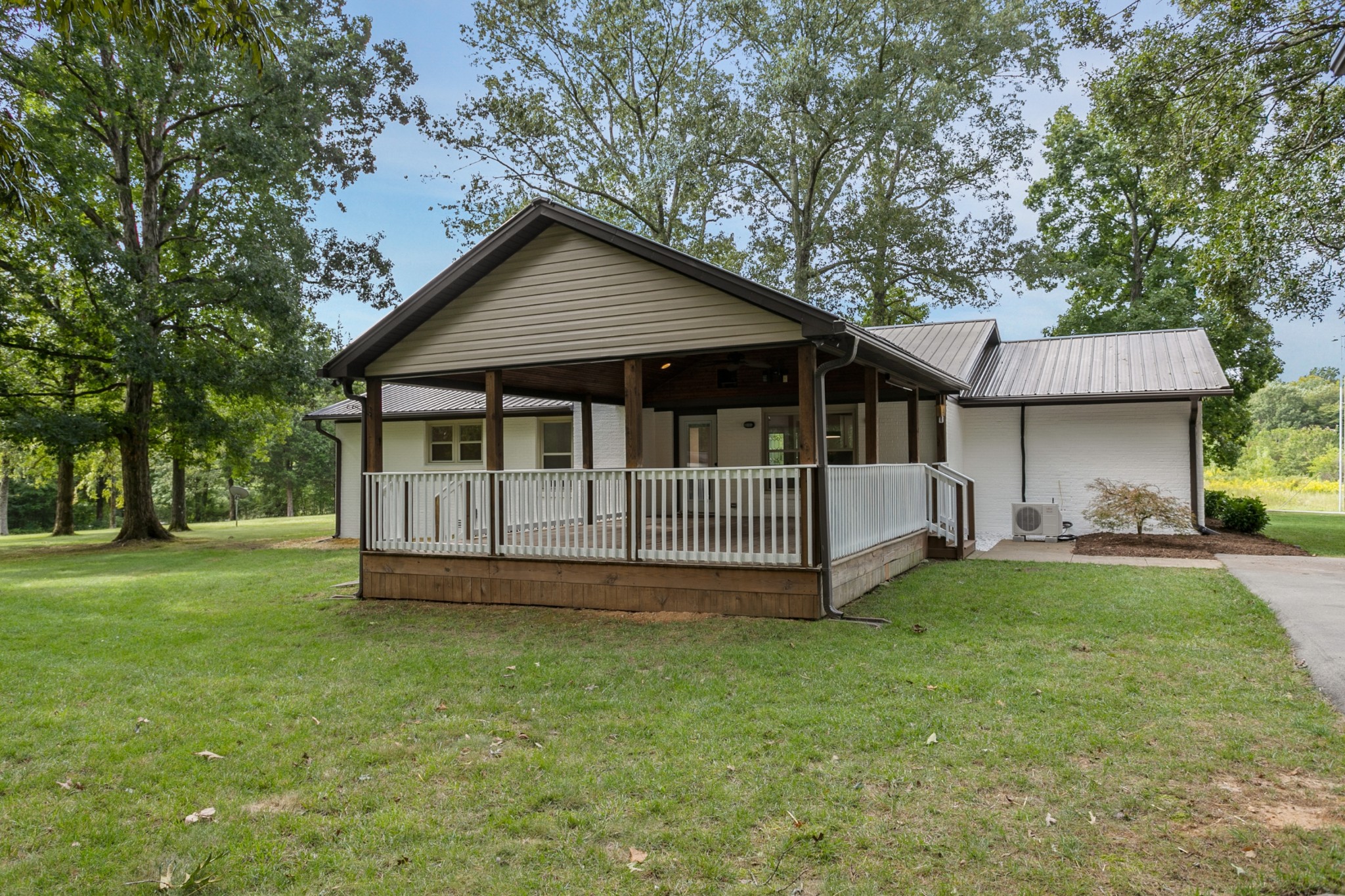 2338 North Road Murfreesboro, TN 37128 - Photo 39 of 48 a view of a house with a yard and deck