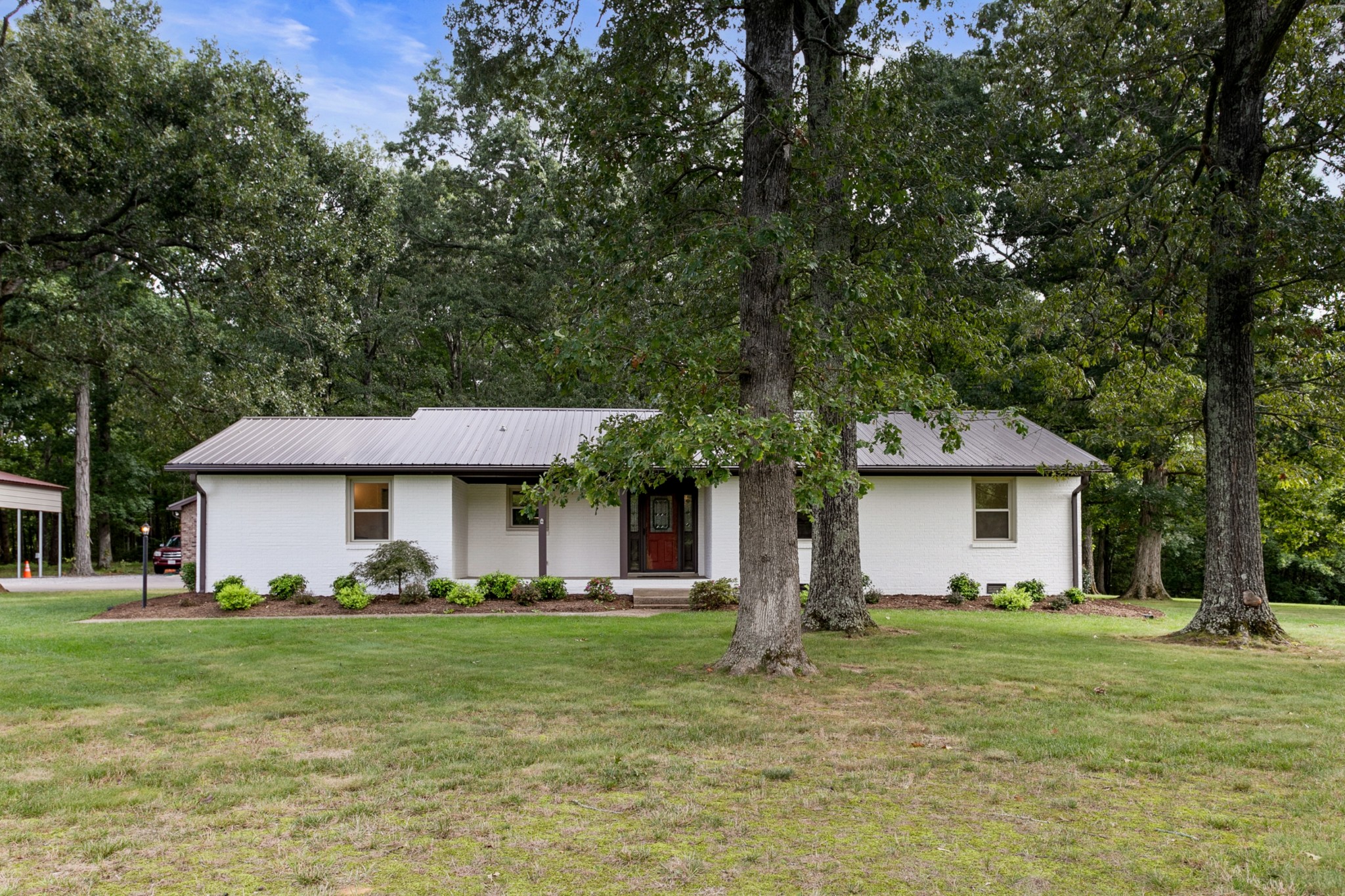 2338 North Road Murfreesboro, TN 37128 - Photo 5 of 48 a front view of a house with garden