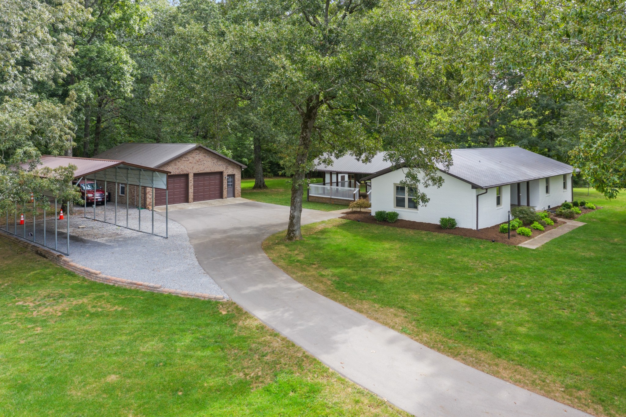 2338 North Road Murfreesboro, TN 37128 - Photo 43 of 48 a view of a house with a yard porch and sitting area