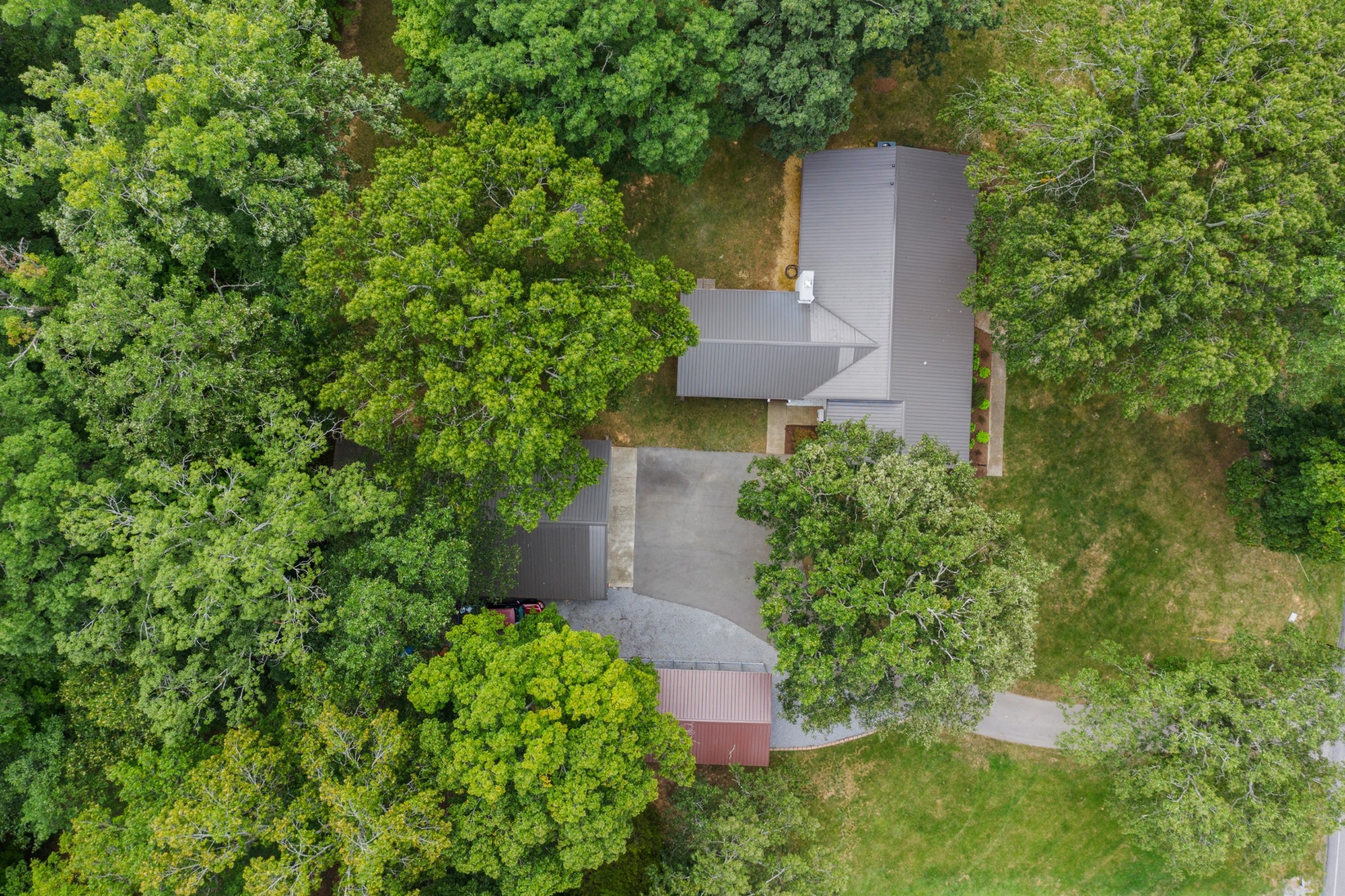 2338 North Road Murfreesboro, TN 37128 - Photo 45 of 48 an aerial view of a house with a yard and garden