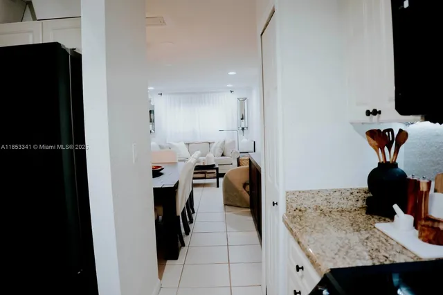a view of a living room and bathroom