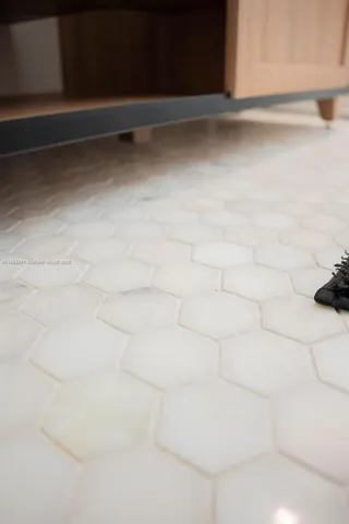 a bathroom with a shower and a bathtub