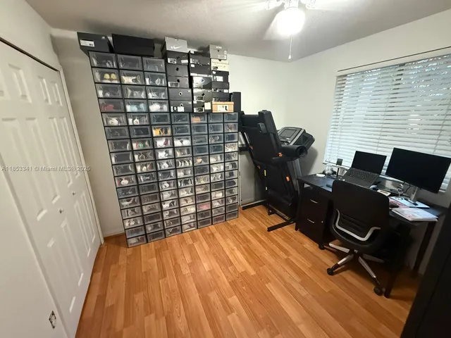 a backyard of a house with wooden fence