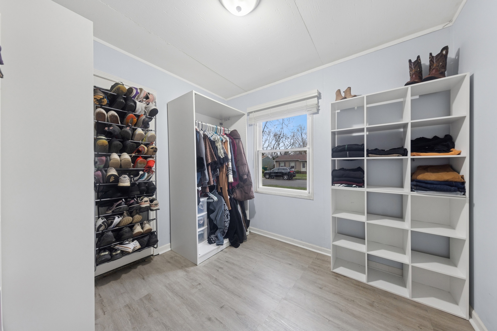 335 Macon Avenue Romeoville, IL 60446 - Photo 13 of 19 a view of walk in closet with empty racks