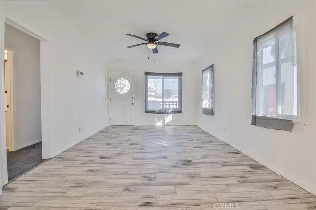 a view of a bathroom from the hallway