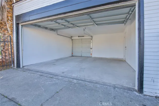 a front view of a house with a garage